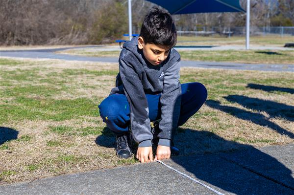 student measuring